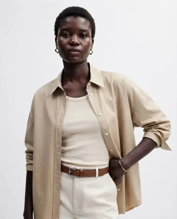 Neutral seamless with a soft key light.