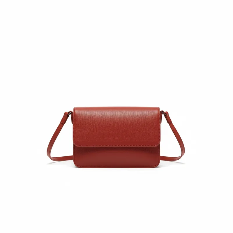 Red leather crossbody bag shown on an AI fashion model after virtual try-on