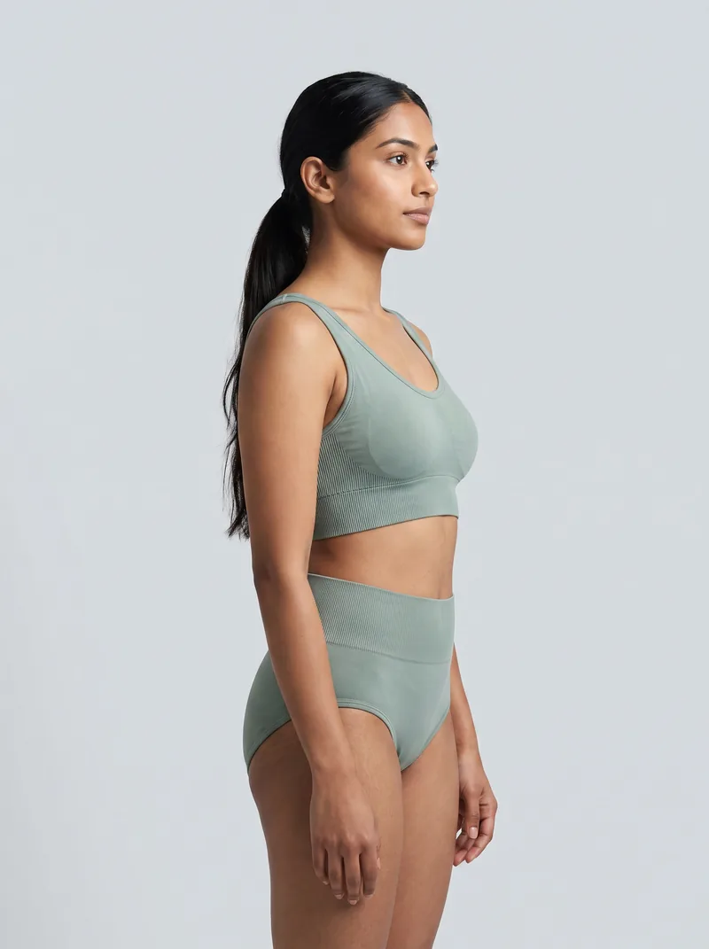 Sage seamless longline set shown on an AI model after virtual try-on