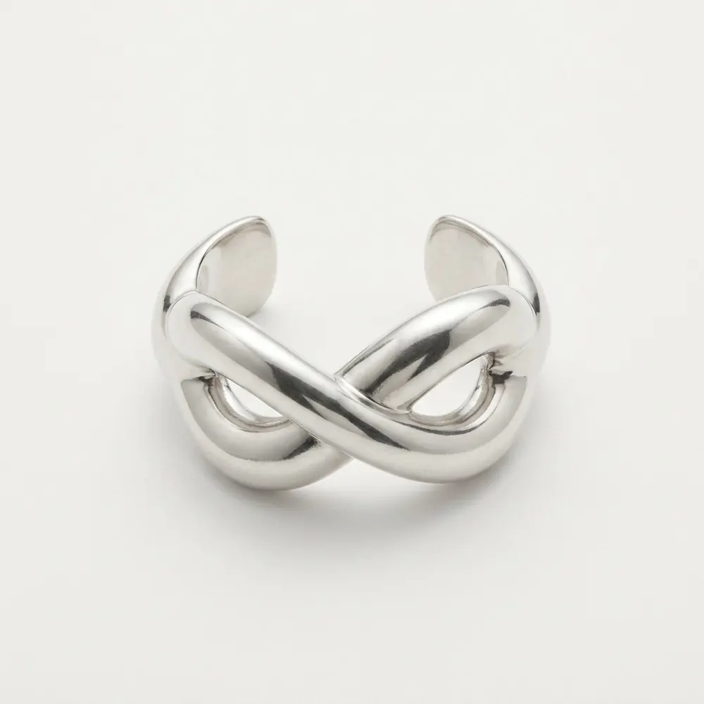 Silver knot cuff bracelet — original product photo before AI try-on