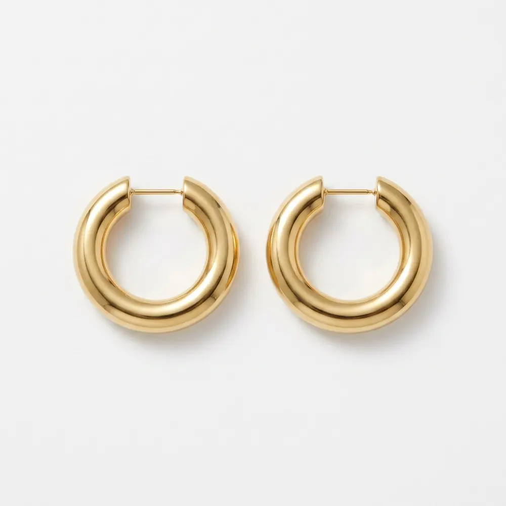 Chunky gold hoop earring — original product photo before AI try-on
