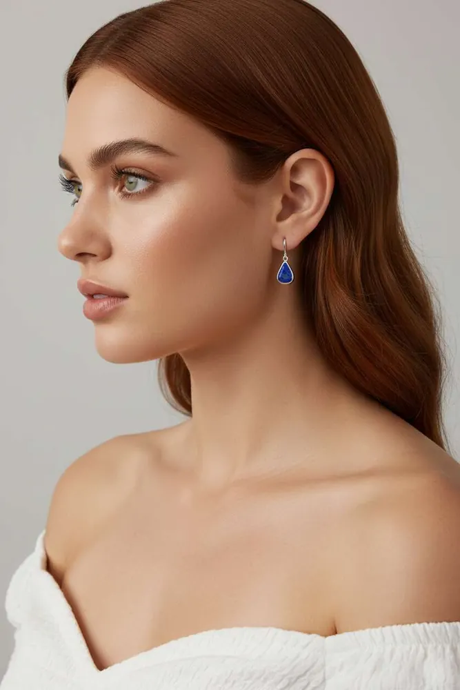 Lapis teardrop drop earring shown on an AI fashion model after virtual try-on