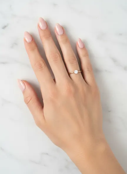 Diamond solitaire ring shown on an AI fashion model after virtual try-on