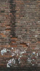 London brick — Weathered red brick wall