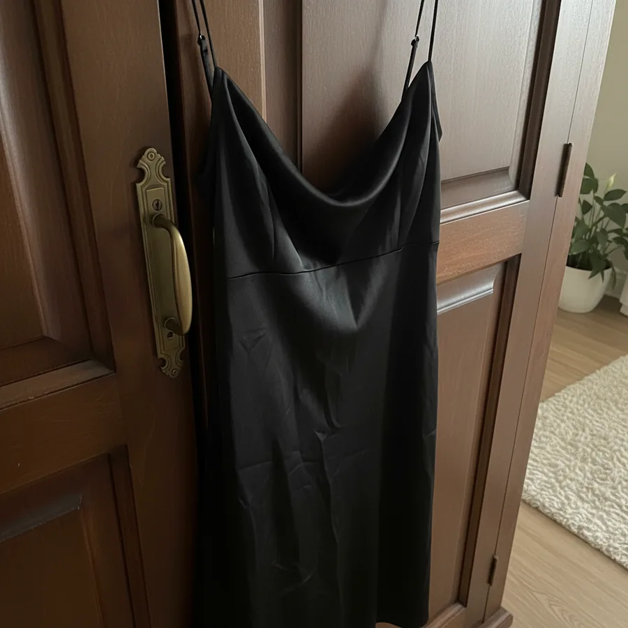 Black satin slip dress — original product photo before AI try-on